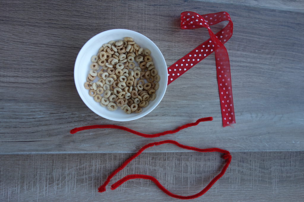 cheerios, 3 pipecleaners and ribbon