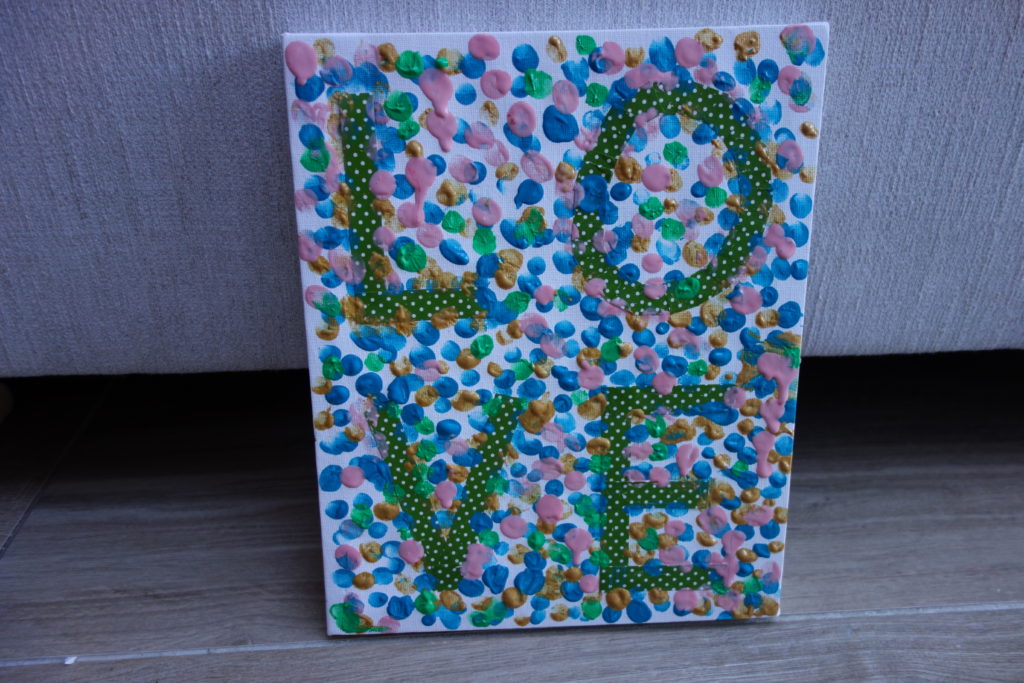 LOVE fingerpainted canvas drying
