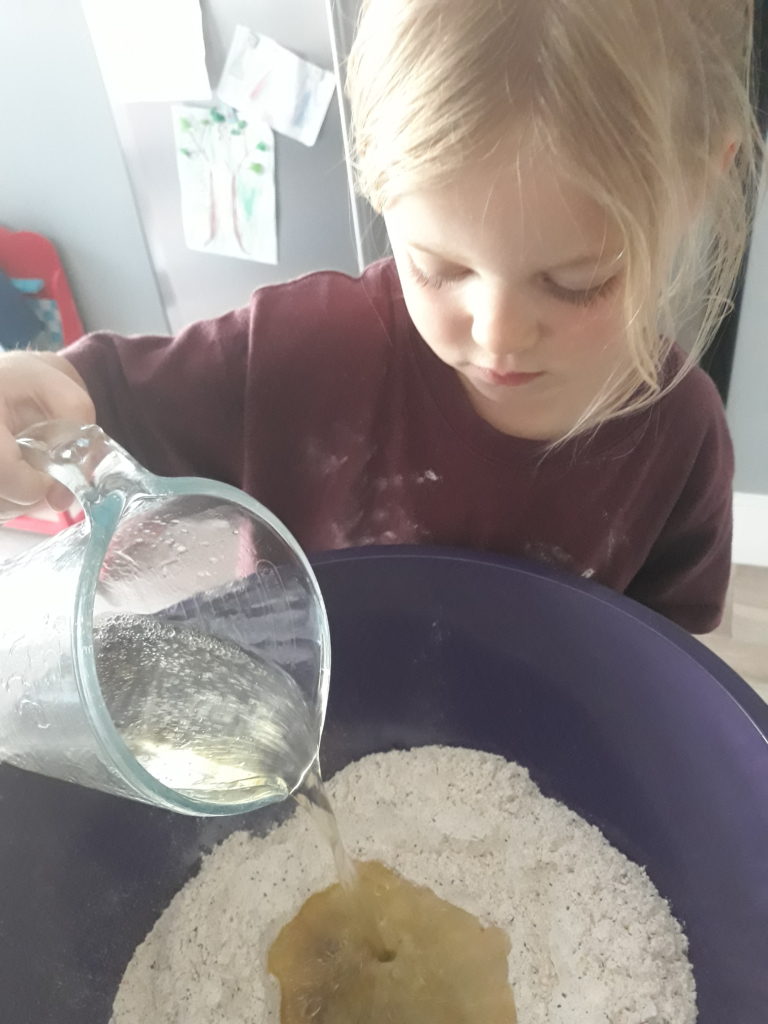 Making pizza with kids using Sweetpea Pantry Dough Mix