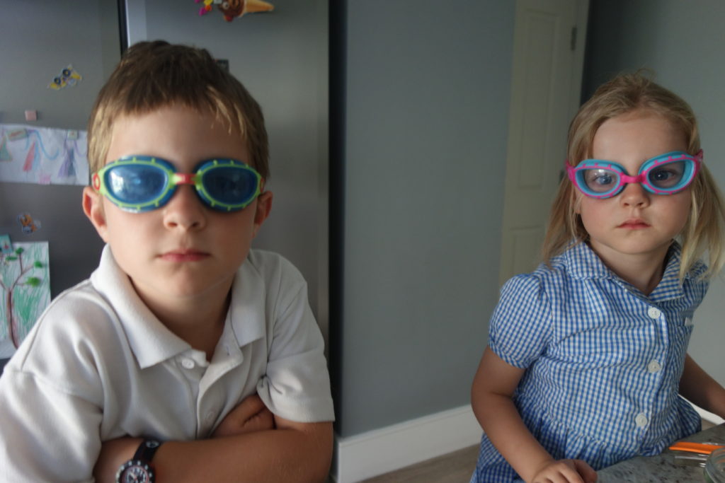 how does rain fall experiment two kid scientists in swimming goggles