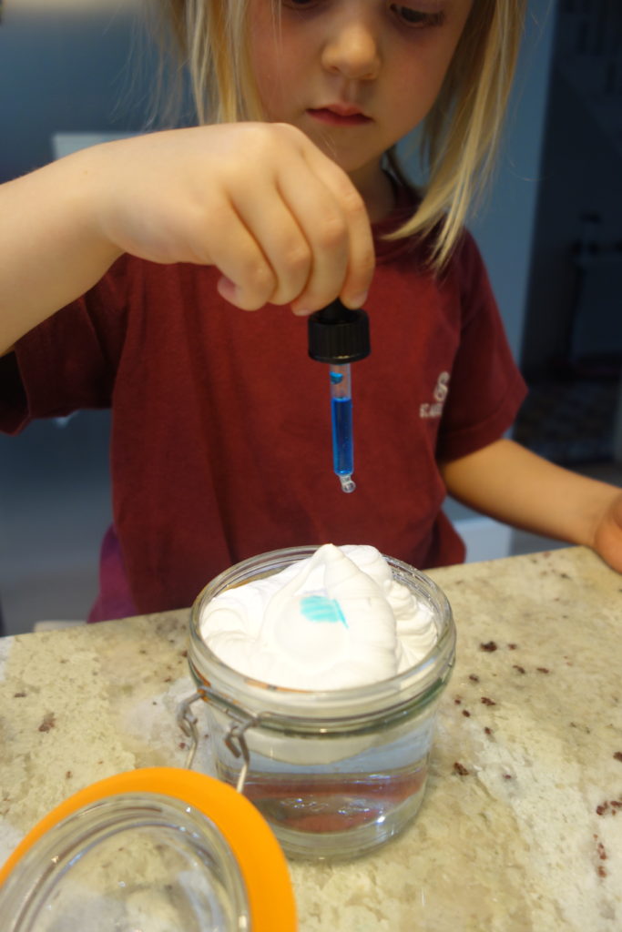 How does rain fall experiment with kids adding blue water drops to cloud