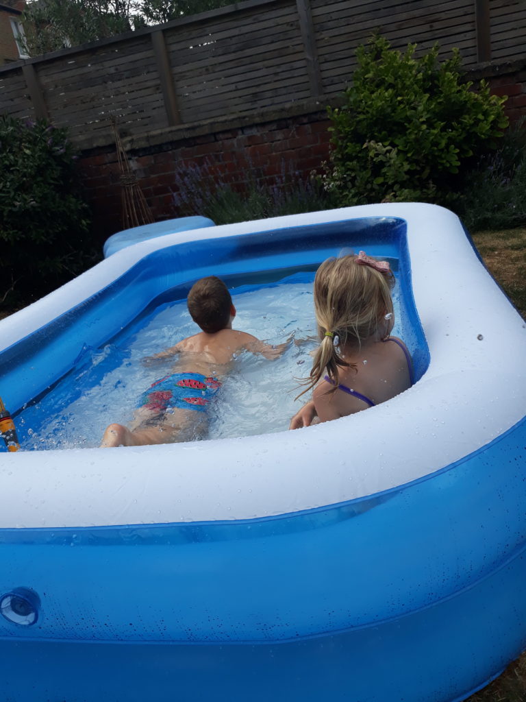 kids having fun in the Chad Valley paddling pool