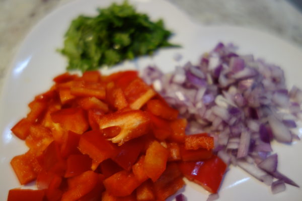 Chopped red peppers, onion and coriander