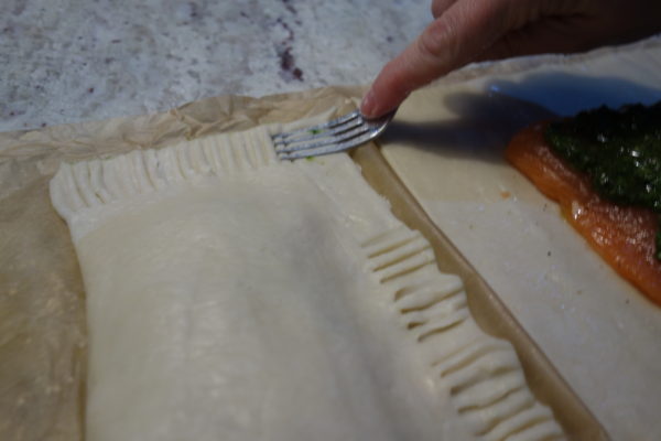 closing pastry pie with a fork