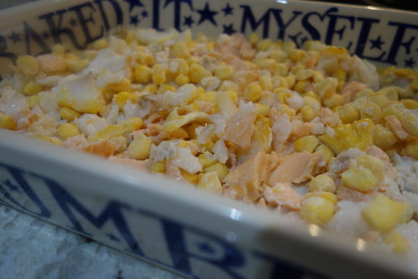 fish pie mix and sweetcorn in a dish