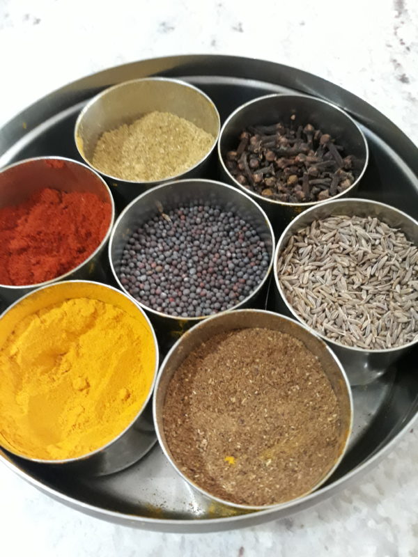 A tray of pretty Indian spices
